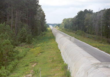 The tunnel for one of the LIGO arms in Livingston, Louisiana. Having two units nearly 2,000 miles apart provides essential error checking and would help show the incoming direction of any gravitational waves. 