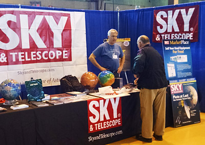 Sky & Telescope editor in chief Peter Tyson in  S&T's NEAF booth, 2015.