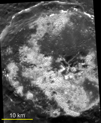 The high-resolution, targeted image of Sander crater reveals that the bright portions of the floor consist of large numbers of shallow irregular depressions (