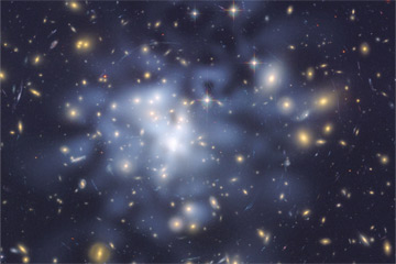 The dark matter concentrations in the galaxy cluster Abell 1689 are tinted blue. Astronomers determined the location of those concentrations from gravitational lensing. NASA, ESA, and D. Coe (NASA JPL/Caltech and STScI)