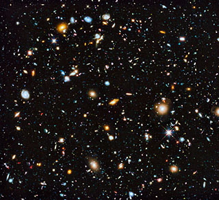 Smattering of distant galaxies in the universe imaged in the Ultraviolet Coverage of the Hubble Ultra Deep Field Project. NASA, ESA, H. Teplitz and M. Rafelski (IPAC/Caltech), A. Koekemoer (STScI), R. Windhorst (Arizona State University), and Z. Levay (STScI)