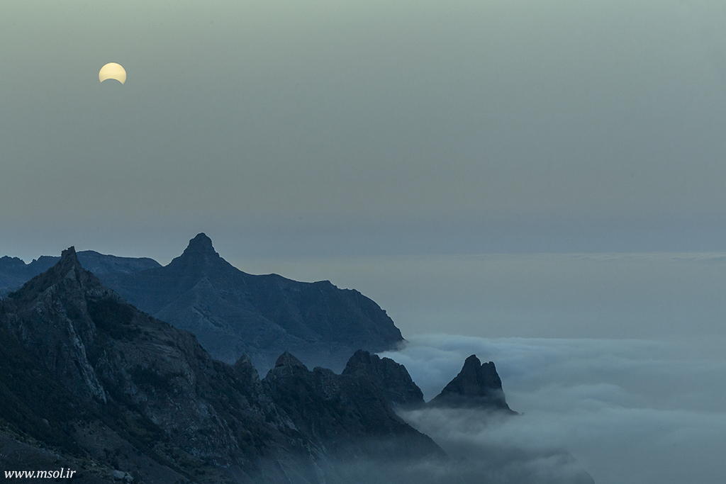 Spectacular view of the partial solar eclipse of August 21, 2017, setting in Tenerife, Canary Islands