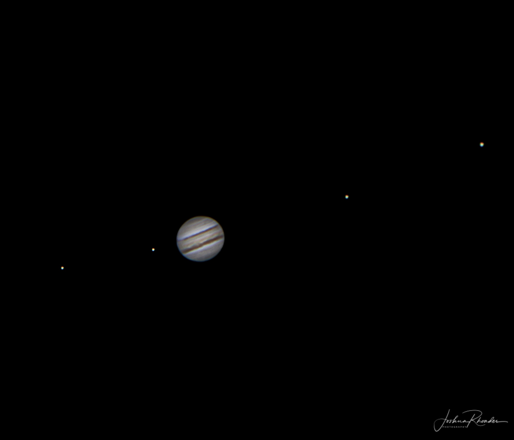 jupiter and its moons with white back