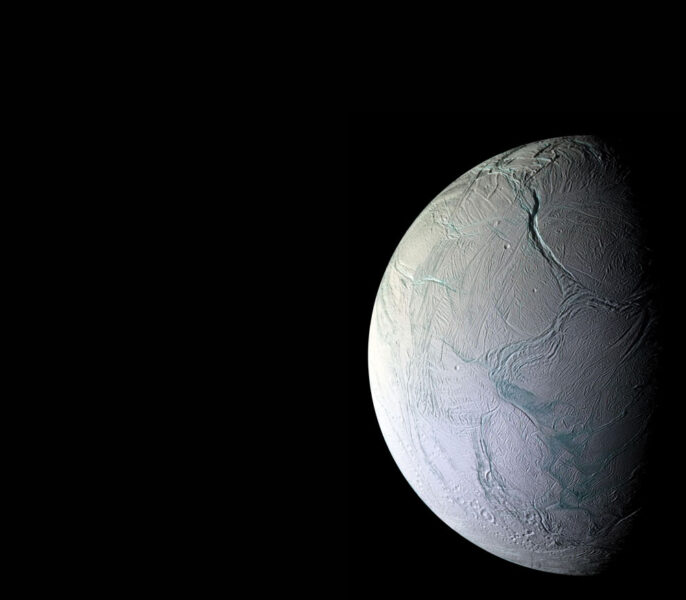 a half of a white planet on the right side against a black background