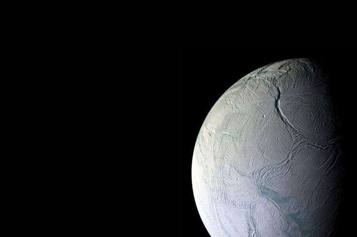 a half of a white planet on the right side against a black background