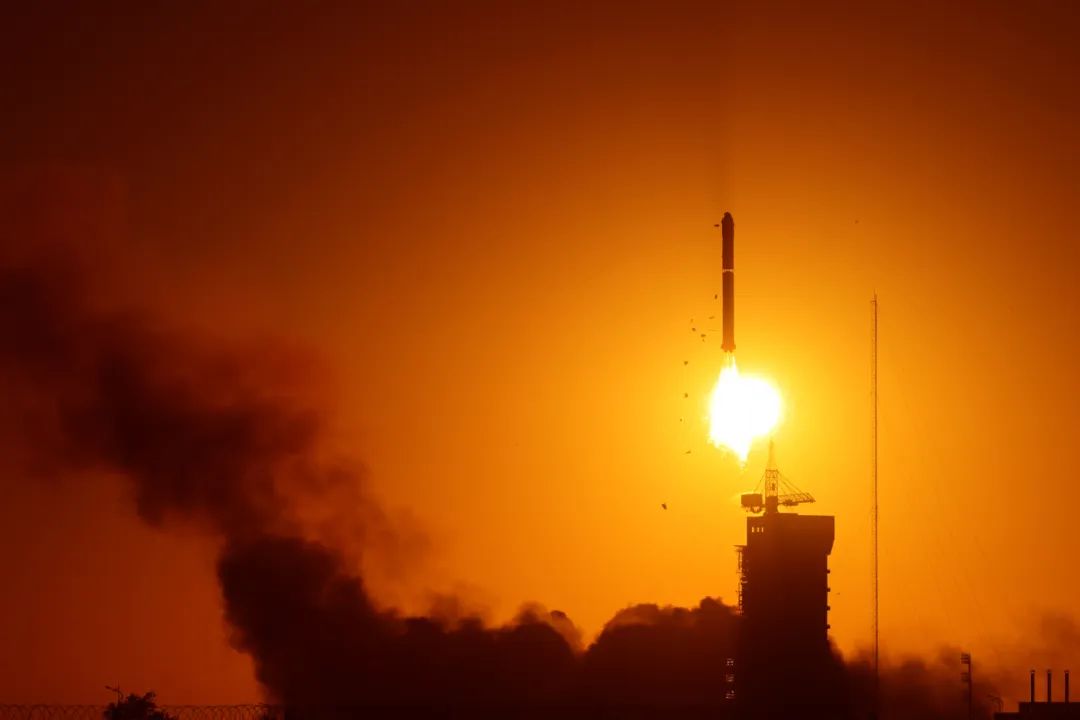 ASO-S launch with sunset in background