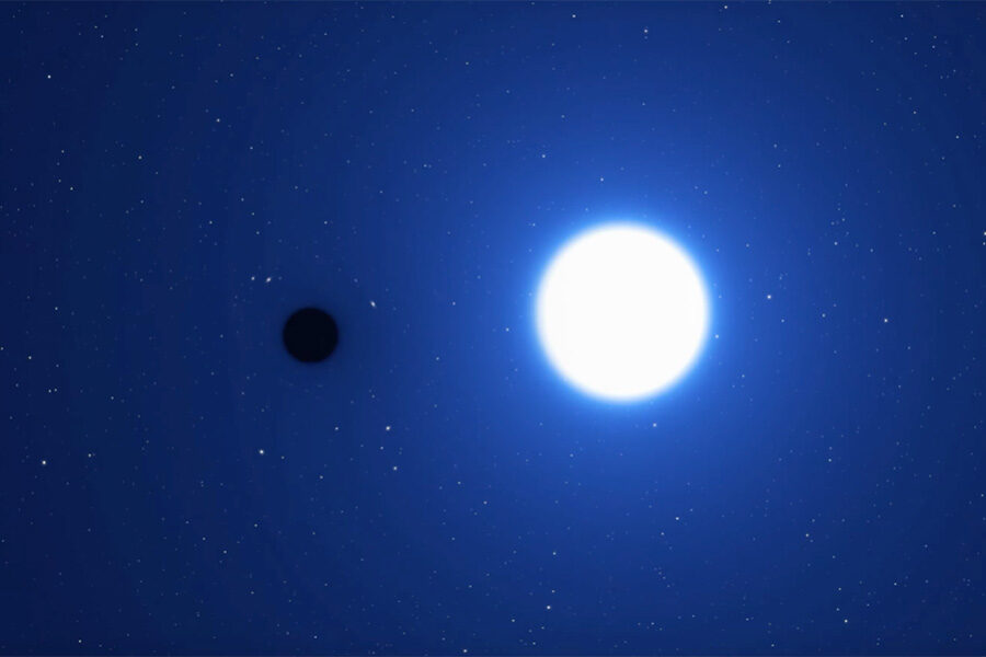 Black sphere near a glowing sphere