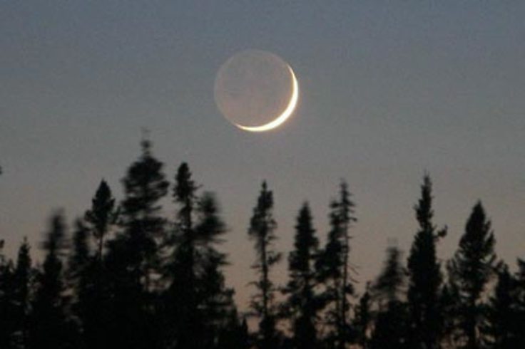 Crescent cradles the 'old moon'