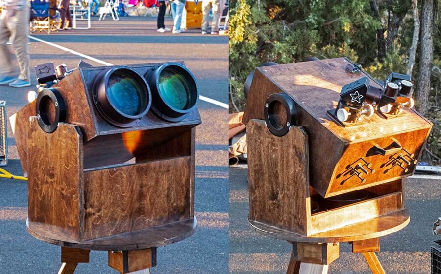 Giant, wood-encased binoculars on a tripod