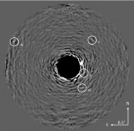 Image of the HR8799 planets with starlight optically suppressed and data processing conducted to remove residual starlight. The star is at the center of the blackened circle in the image. The four spots indicated with the letters b through e are the planets. This is a composite image using 30 wavelengths of light and was obtained over a period of 1.25 hours on June 14 and 15, 2012.