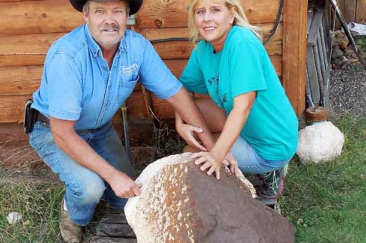 The Hommels pose with Clarendon (c) meteorite