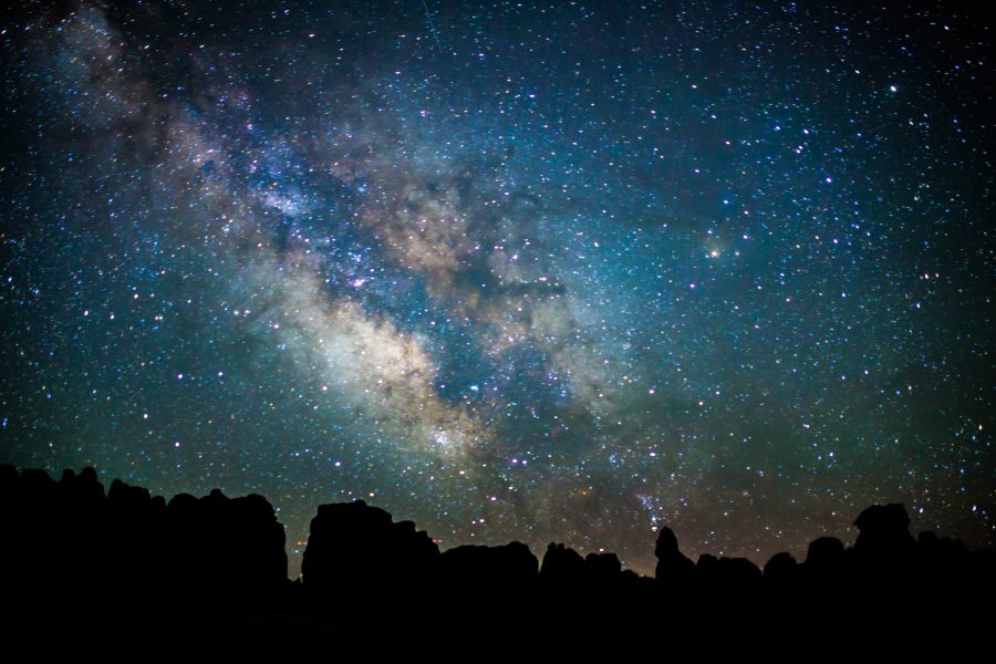 milky way above the silhouette of rock pinnacles