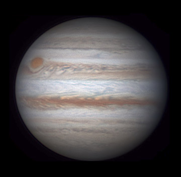 Jupiter on May 29th. South is up. The Great Red Spot still displays strong color, and the Red Spot Hollow is emphasized by a dark line along its northern edge. We see the Red Spot's turbulent wake extending almost all the way across Jupiter's face. On this side of Jupiter, the South Equatorial Belt is much paler than the NEB; it's less so on the other side. Christopher Go image.