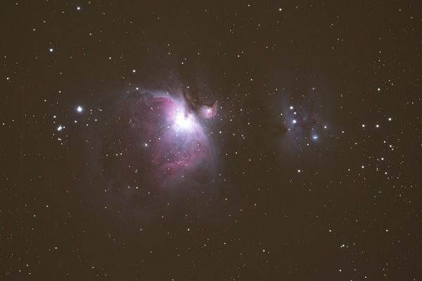 Orion Nebula image with red-brown light pollution
