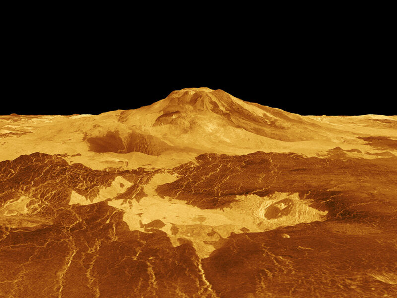 Sulphur-tinged volcano rises above surface on Venus