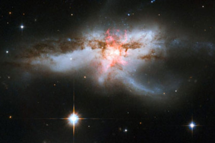 NGC 6240: Cosmic Butterfly