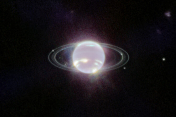 Close-up on glowing Neptune and its gossamer rings