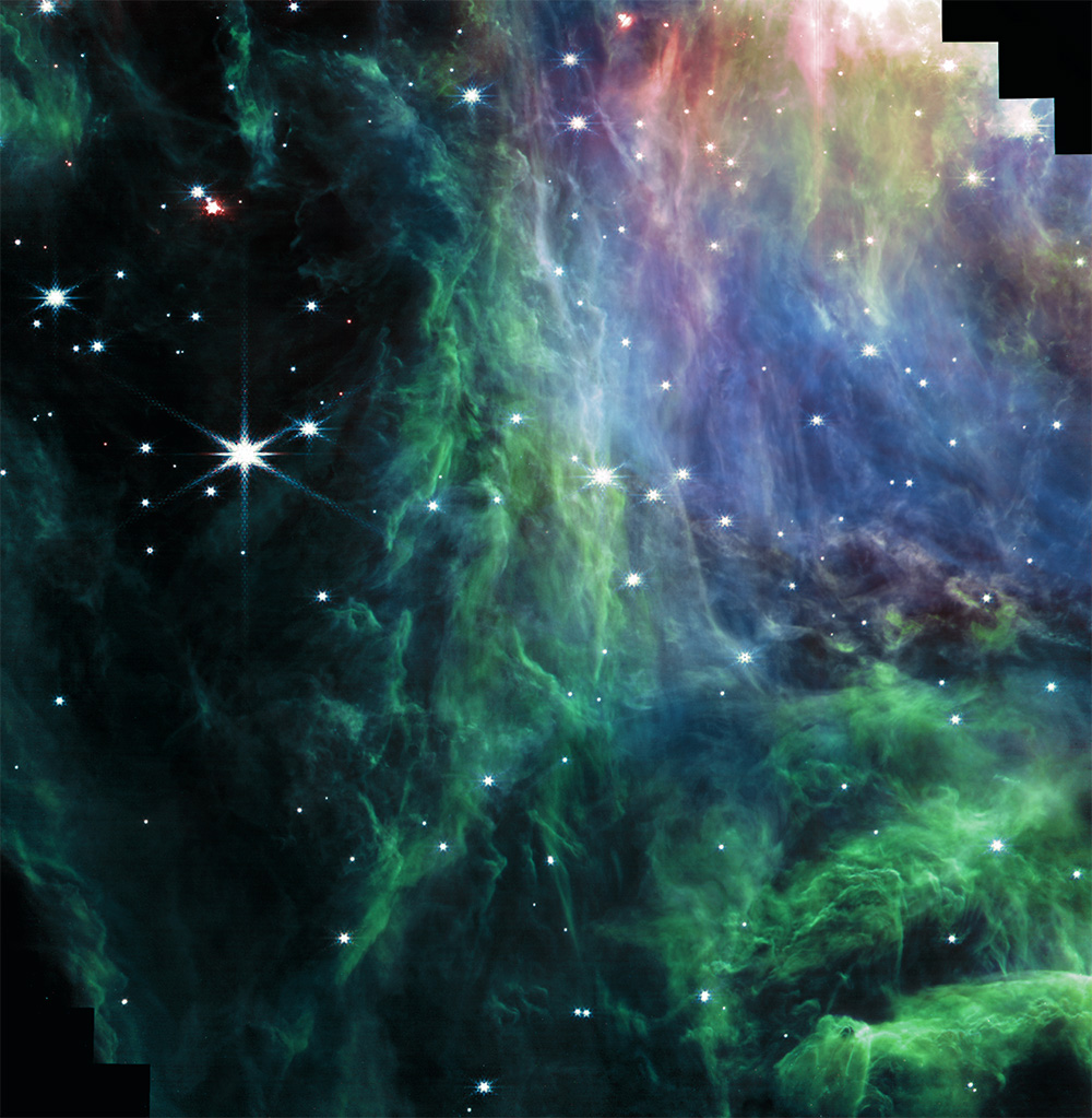 Green, blue, and pink veils of dusty gas in the Orion Nebula