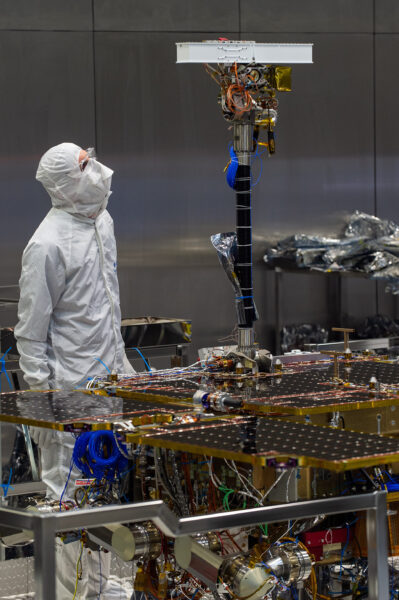 Engineer with Rosalind Franklin rover in cleanroom