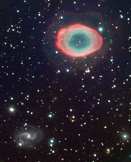 Ringed Nebula near spiral galaxy on the sky