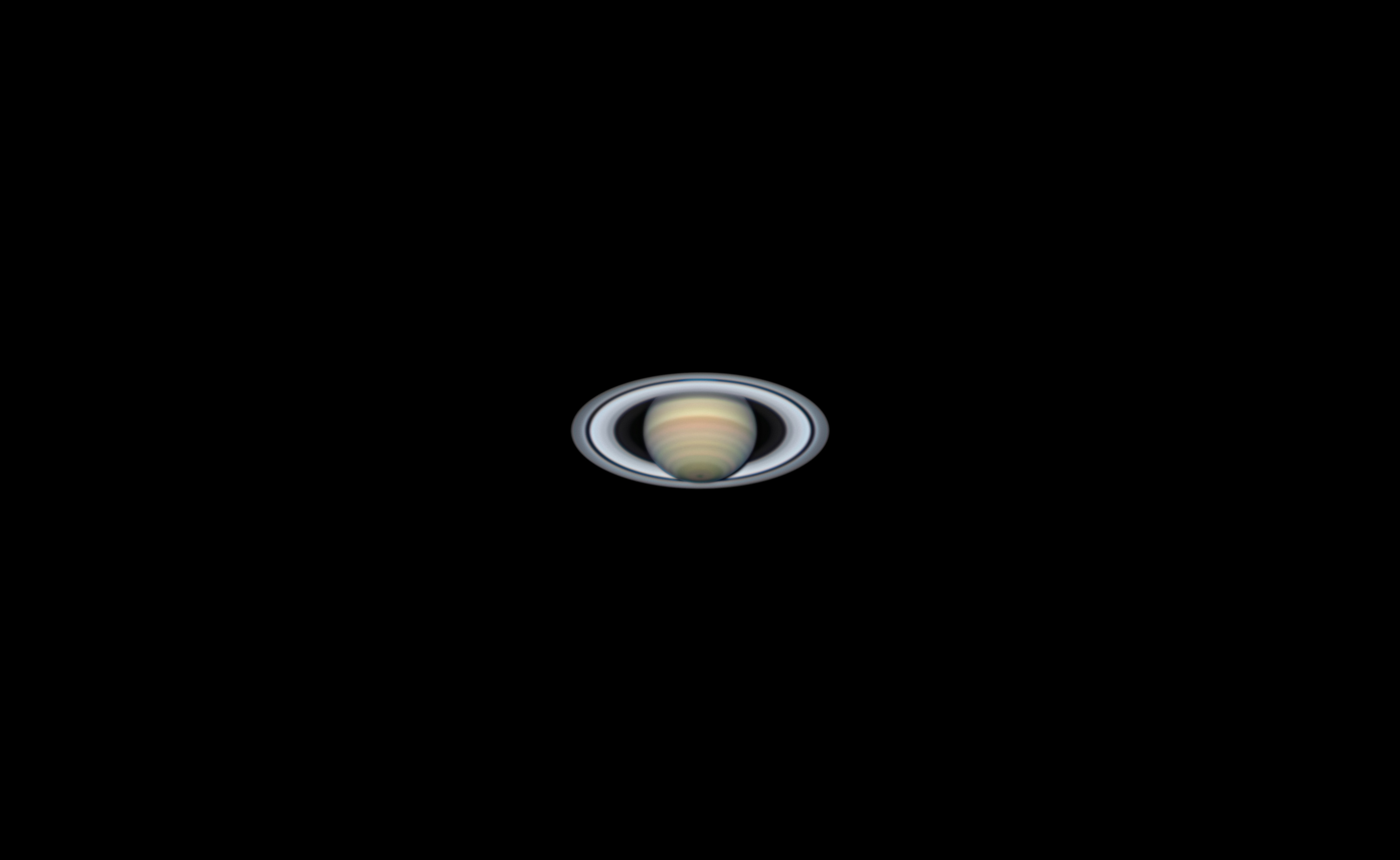 Saturn, about as it appears visually in an optically excellent 12-inch telescope during rock-steady seeing.