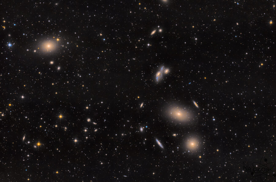 Black field dotted with hundreds of galaxies