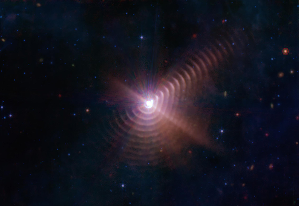 Regular rings of dust surround a brilliant central star