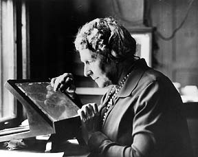 Annie Jump Cannon examines glass plate