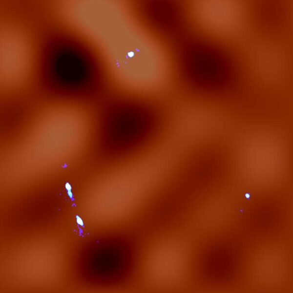 Small squiggles in blue are ALMA data while fuzzy orange background indicates dark matter map derived from gravitational-lensing model