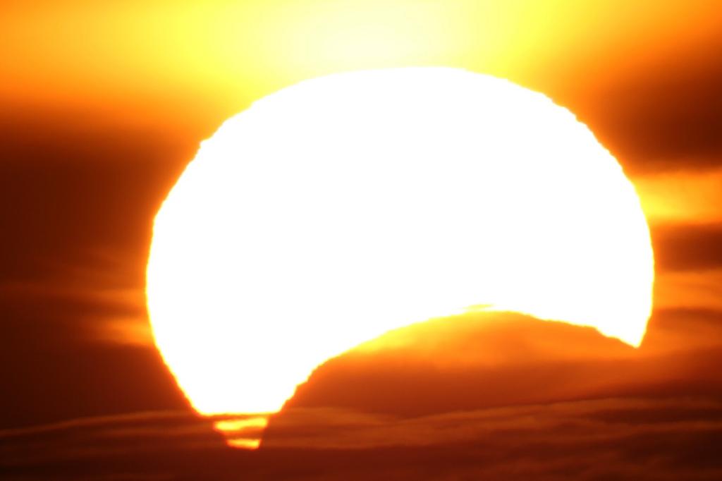 Partial eclipse Montreal Lucian Gurban Sky & Telescope Sky