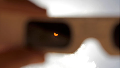 Partial eclipse seen through eclipse glasses