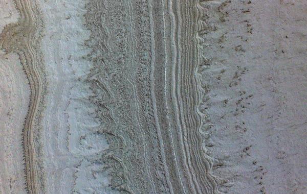 wavy features appear on the Martian surface indicate smectites