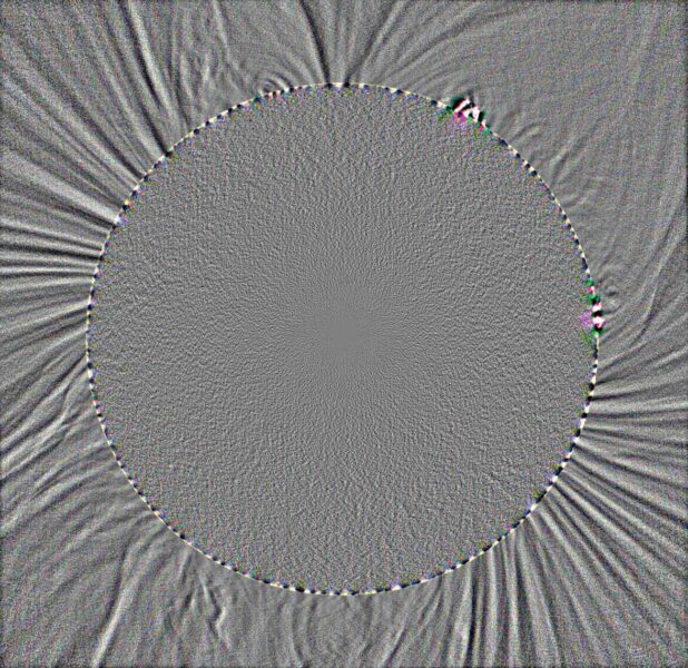 a grey circle against a rippled grey background