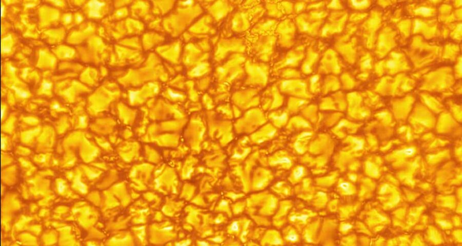 yellow and orange image in the shape of rocks or bubbles