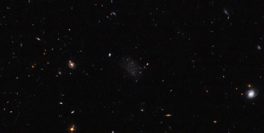 Donatiello II appears as a smattering of stars on a black field dotted with background galaxis