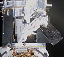 Astronauts Servicing Hubble