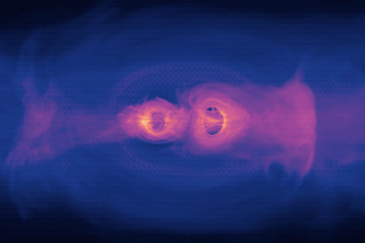 Still from simulation of two supermassive black holes merging