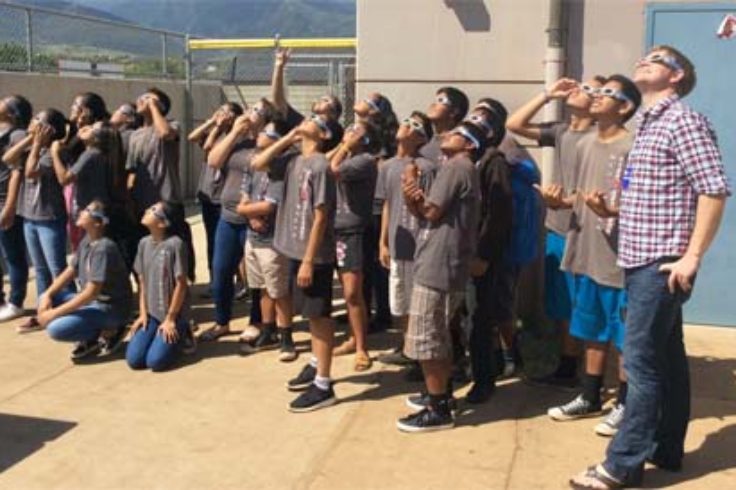 Students watching a solar eclipse