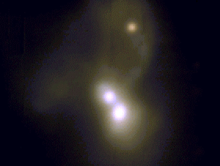 three bright points represent three merging galaxies